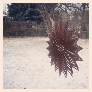 While winter hangs on a bit, there are flurries and grey