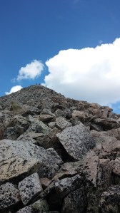 My hiking partner reaching 14,197 way before me